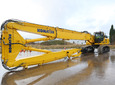 Komatsu представя новия багер разрушител PC490LC-10 с дълга стрела 